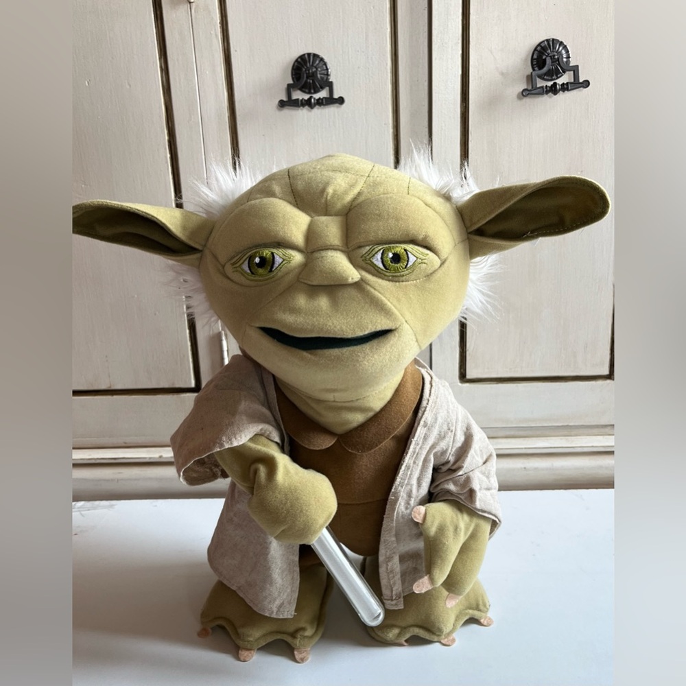 Star Wars Lightsaber Battle Yoda Deluxe 16-Inch Talking
Plush interactive toy